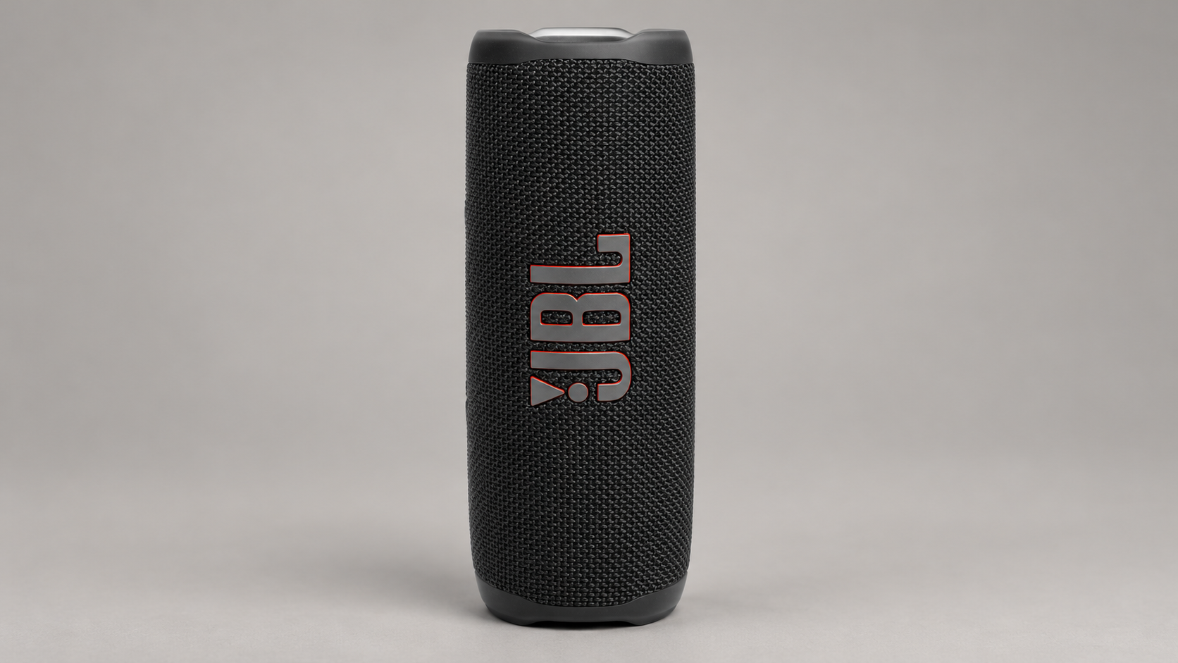 Editorial illustration of one black JBL Flip 6 speaker; no regional pack or supplied-accessory claim.