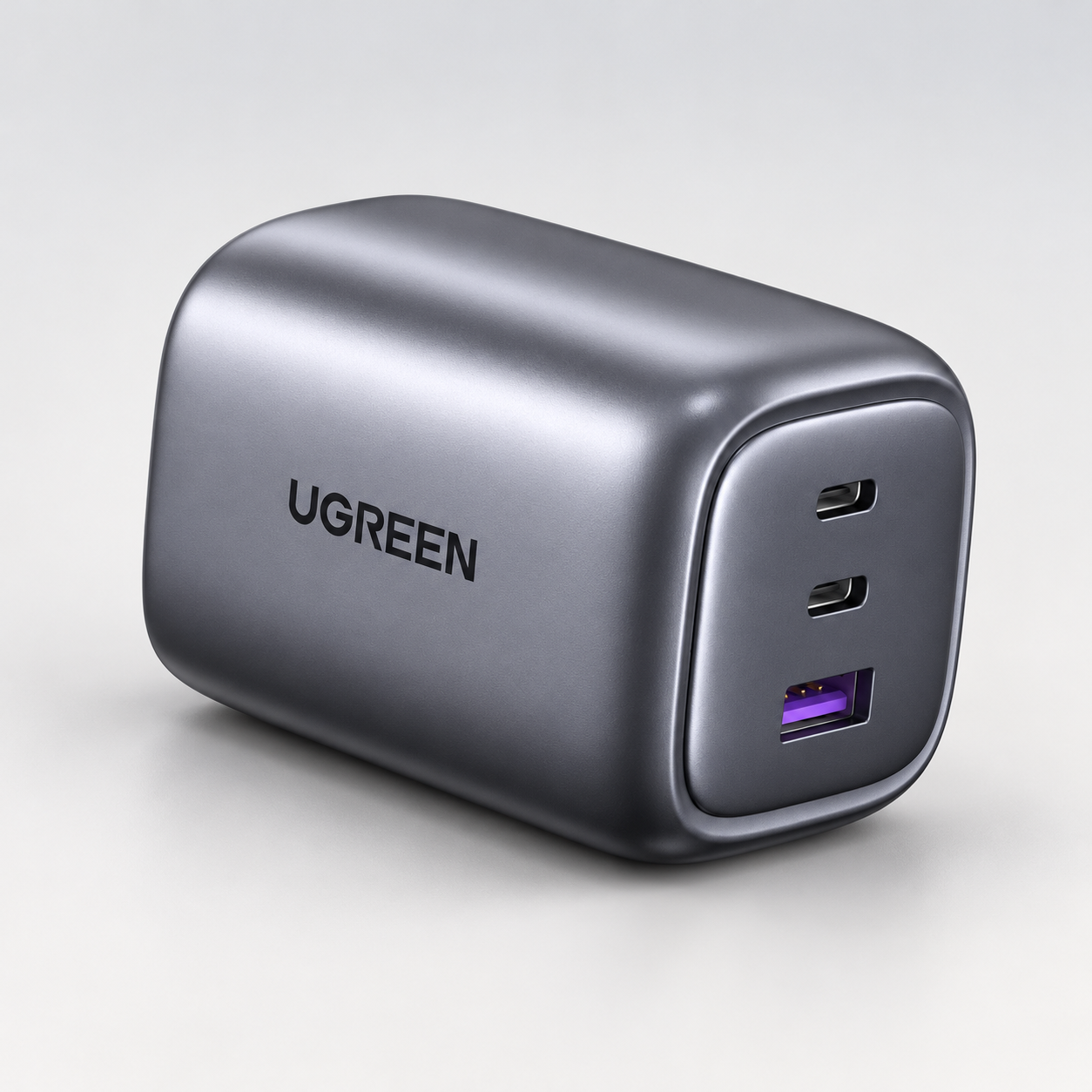 Editorial illustration of UGREEN Nexode 65W 3-port charger 90663, UK foldable plug; visible model recognition only, not a technical or complete-pack diagram.