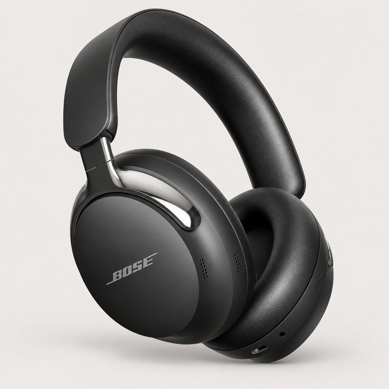 Editorial illustration of Bose QuietComfort Ultra Headphones second generation in Black, with oval ear cushions and metal yokes.