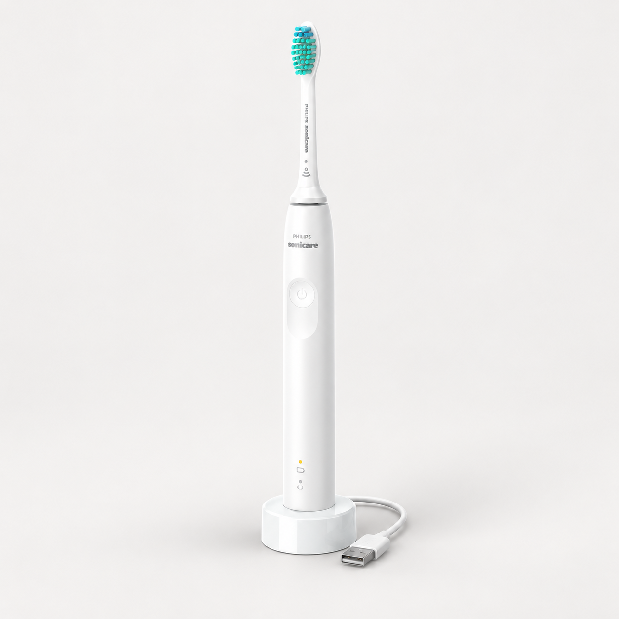 Editorial illustration of the Philips Sonicare 3100 HX3671/13 white handle and brush head, with charging base and USB lead shown.