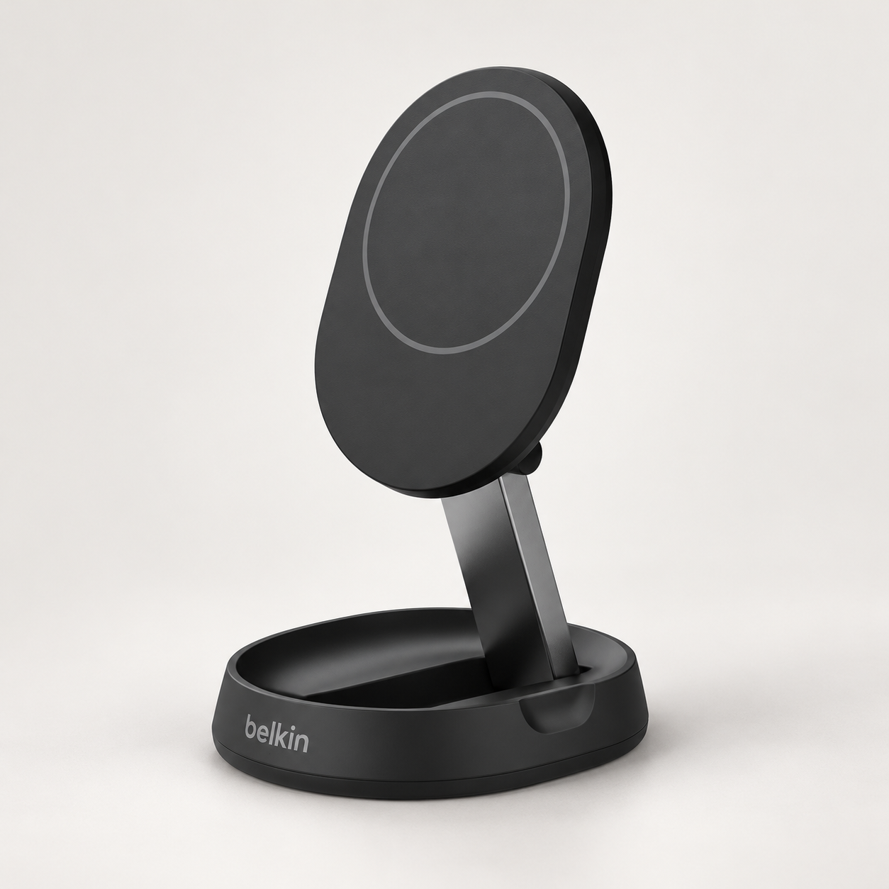 Editorial illustration of Belkin WIA008ttBK, black convertible Qi2 charging stand; visible model recognition only, not a technical or complete-pack diagram.